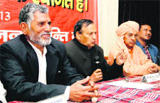 UKD leader Diwakar Bhatt addresses a press conference in Dehradun on Friday.