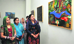 Visitors thronging the three-day painting exhibition of Rajinder Pal Singh at Kala Kendra in Jammu on Friday. Tribune Photo: Inderjeet Singh