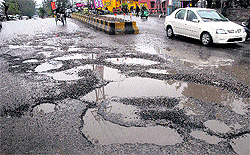 Ladowali Road (above) and Grain Market Road which have been damaged after the recent rain in Jalandhar