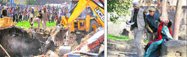 Police officials oversee the rescue operation at the mishap site on the Bahadurke road in Ludhiana on Friday; and (right) a policewoman tries to console the relative of a victim outside the Civil Hospital. 