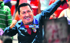 A supporter of Hugo Chavez wearing a mask in Caracas.