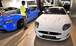 Jaguar luxury cars at a Jaguar Land Rover showroom in Mumbai. JLR is investigating the potential of manufacturing cars in India, company sources said, as the British luxury carmaker looks to build on its growth in emerging markets with the help of Indian parent Tata Motors