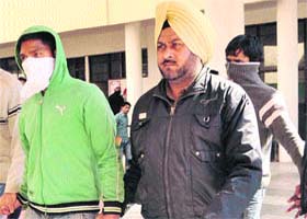 The two accused being produced by the police in the Panchkula Court, on Saturday
