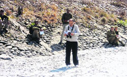 Forest officials during a bird-watching exercise near Sundernagar.