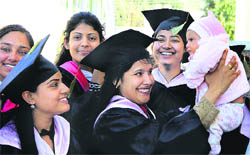 A student of BD Arya Girls College, in a jubilant mood, plays with her child after the annual convocation held in Jalandhar Cantonment on Saturday.