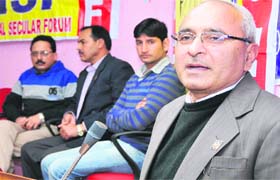 Prof VD Singh, Director, Distance Education, delivers an address during foundation day celebrations of National Secular Forum in Jammu University on Saturday