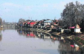 Reflections: A view of the Jhelum in Srinagar on Friday