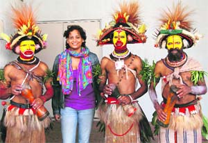 Anjaly Thomas (with Papuan dancers) It is best not to bite into the squishy stomach of a fried tarantula