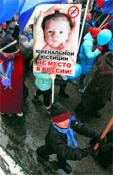 People march during a rally in defence of Russian children in Moscow on Saturday.