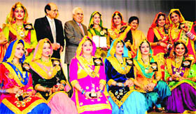 Kapil Sibal (third from left) with students during the prize distribution function at MCMDAV College in Sector 36, Chandigarh, on Sunday.