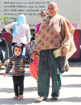 A patient returns home in the absence of a doctor in the health centre.