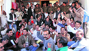 Private commercial vehicle drivers hold a demontsration in support of their demands in Dehradun on Saturday