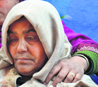 Wailing mother of Mudasir Ahmad Malla.