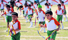 Students take part in the sports day at Heritage School in Jammu on Sunday.