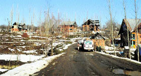 A view of a snow-bound area of Dolipora, Handwara, in district Kupwara, north Kashmir, after fresh snowfall occurred in the Valley last week, on Sunday.