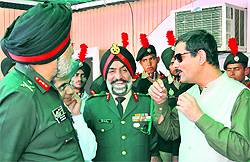 Union Minister of State for Defence, Youth Affairs and Sports Jitendra Singh with officers of the National Cadet Corps in Amritsar on Sunday