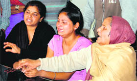 The wailing family members of Josan Masih in Amritsar on Monday.