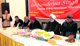 President of the state minority commission Narendar Jeet SIngh Bindra (in white turban) at a function in Mussoorie on Monday.