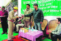 Participants of a bird-watching camp being given certificates at a function organised by the eco-tourism wing of the Forest Department on Monday.