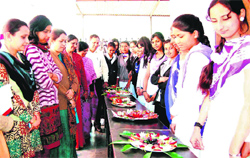 Girl students of Shravan Nath Math Jawaharlal Nehru College show thier salad decorative items in Haridwar on Monday. Tribune photo: Rameshwar Gaur