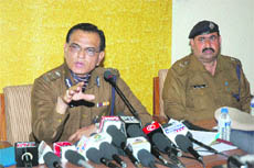 Commissioner of police Rajbir Deswal and DCP (Urban) Ashok Kumar during a meeting with traders in Ambala recently. 