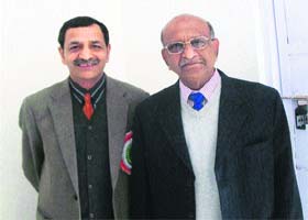 Prof Chandra Shekhar (right), scientist at IIT, New Delhi, with Dr AS Singha, Registrar, NIT, Hamirpur, in Sundernagar