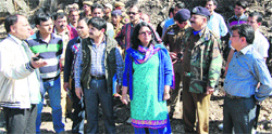 Divisional Commissioner, Jammu, Pardeep Gupta and other officers take stock of the Shiv Khori Mela arrangements at Ransoo on Monday. A Tribune Photo.