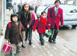 Students on their way to school in Srinagar. File photo: Yawar Kabli