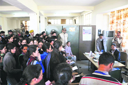 Girls from hostels gherao the Chief Warden for their demands at HPU in Shimla on Monday. Photo: Amit Kanwar