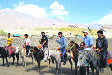 A team of horse polo members from the University of Kashmir which was trained by the Army at Drass.