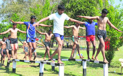 Aspirants take part in a physical fitness test during a recruitment rally on the Army compound in Ludhiana on Tuesday.