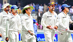 The Indian team walks off the field after their win over Australia in the second Test in Hyderabad on Tuesday