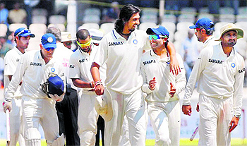 Indian players walk off the field after their win over Australia in the 2nd Test in Hyderabad on Tuesday. Spinners R Ashwin and Ravindra Jadeja produced a mesmerising spell as India crushed the clueless visitors by an innings and 135 runs