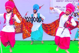 Boys perform bhangra during a function at GNDU College, Verka, in Amritsar on Wednesday