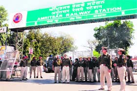 Heavy police force outside the Amritsar railway station during the rail roko protest by farmers organisations in support of their demands