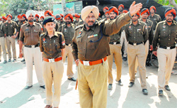 Bathinda SSP Ravcharan Singh Brar reviews law and order situation near the site of farmers dharna in Rampura Phul on Wednesday. Tribune photo: Pawan Sharma