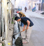 MCB workers cleaning an open drain at Guru Nanakpura in Bathinda. Tribune photo: Pawan Sharma