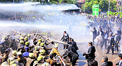 The Chandigarh police uses water cannons on agitating lawyers outside the Raj Bhawan in Chandigarh on Wednesday
