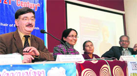 AB Lal, a former ADGP, addresses a seminar on equality and social justice held at DBS College in Dehradun on Wednesday.