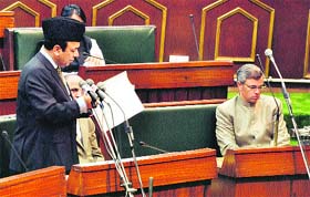 Finance Minister Abdul Rahim Rather presents the annual Budget in the Assembly on Wednesday. Chief Minister Omar Abdullah is also seen in the picture