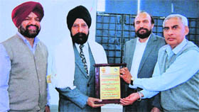 Vice-Chancellor of Guru Nanak Dev University Prof Ajaib Singh Brar being felicitated at a national seminar on language science and technology at GNDUs Regional Campus in Jalandhar on Wednesday.