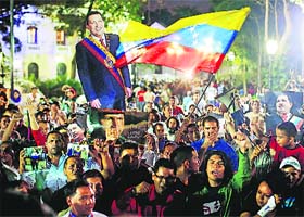 Supporters of late Hugo Chavez at a rally in Caracas on Tuesday