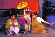 Artistes enact a scene from the play, Munna Ki Wapsi , at the Punjab Kala Bhawan, Sector 16, in Chandigarh on Thursday.