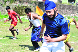 Students participate in a sports meet at Shravan Nath Math Jawaharlal Nehru College in Haridwar on Thursday. Tribune photo: Rameshwar Gaur