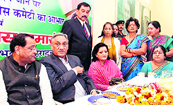 Chief Minister Vijay Bahuguna and Uttarakhand Congress chief Yashpal Arya with other leaders at the state party office on the eve of the visit of Rahul Gandhi in Dehradun on Thursday