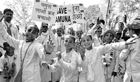 Children march towards Delhi in a drive to save the Yamuna at Pirthla in Palwal district on Thursday.