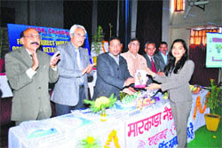 Anil Dhantori (third from left), MLA, Shahabad (M), releases a book during a seminar at Markanda National College, Shahabad-Markanda, recently.