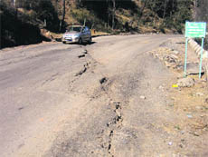 A damaged portion of the Jammu-Srinagar National Highway in Batote.