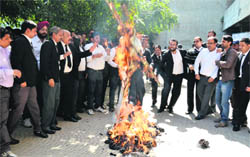 Lawyers burn an effigy of the Chandigarh Police in Ludhiana on Thursday. 
