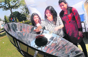 Students of DAVIET visit a solar equipment exibition during aDAVitya-2013, a three-day national-level annual technical festival of the institute, in Jalandhar on Friday.